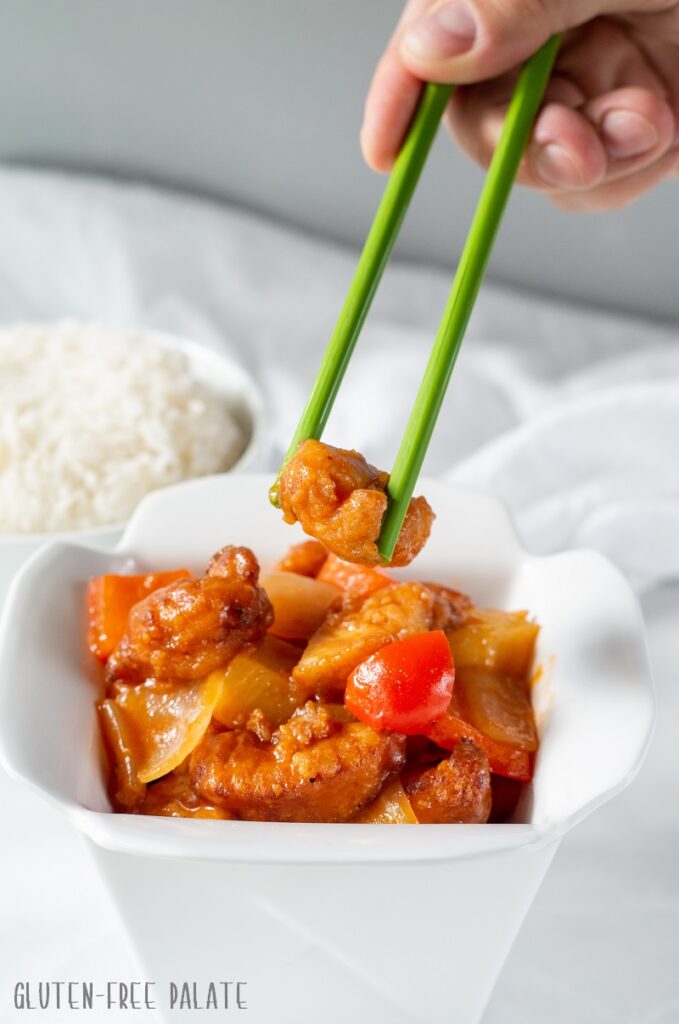 Gluten-Free Sweet and Sour Chicken in a white dish.