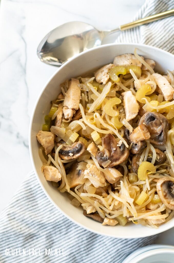 Chicken subgum chow mein in a white bowl.