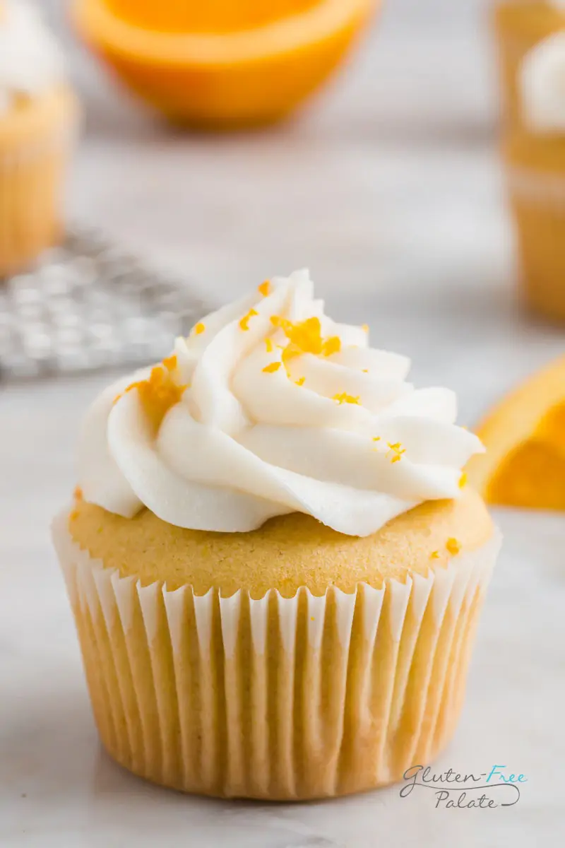 close up of a gluten free orange cupcake