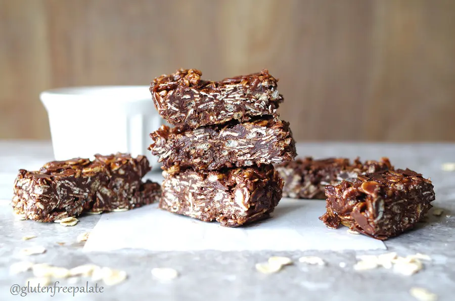 three chocolate coconut oat bars stacked