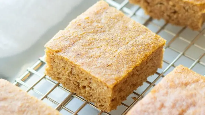 paleo pumpkin bars cut in squares on a wire rack