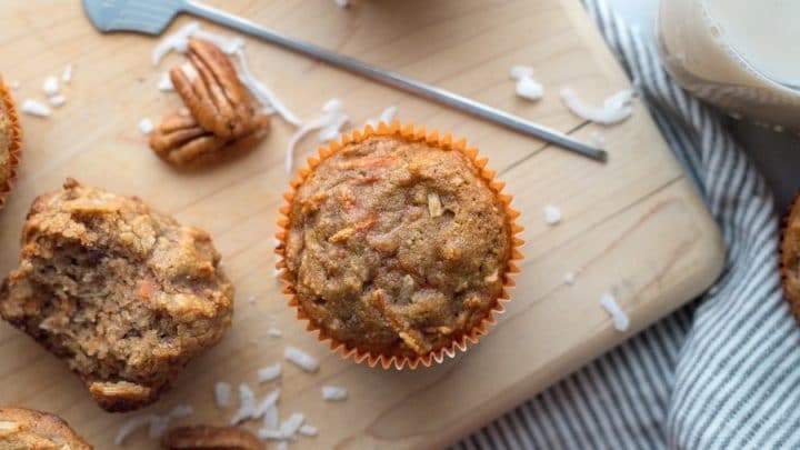 a top down view of a paleo carrot muffins on a cutting board