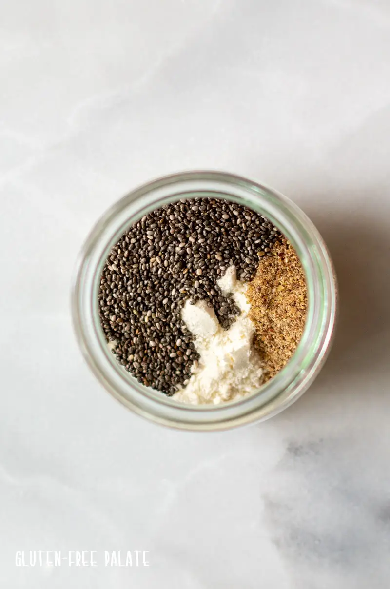 top down view of a jar with coconut flour, flaxseed and chia seeds