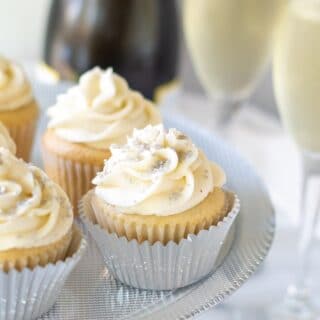 Gluten Free Champagne Cupcakes with champagne glasses