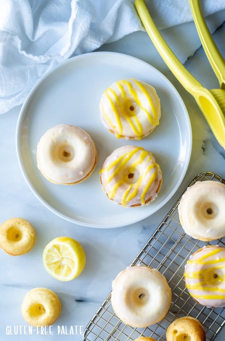 gluten free lemon donuts on a white plate