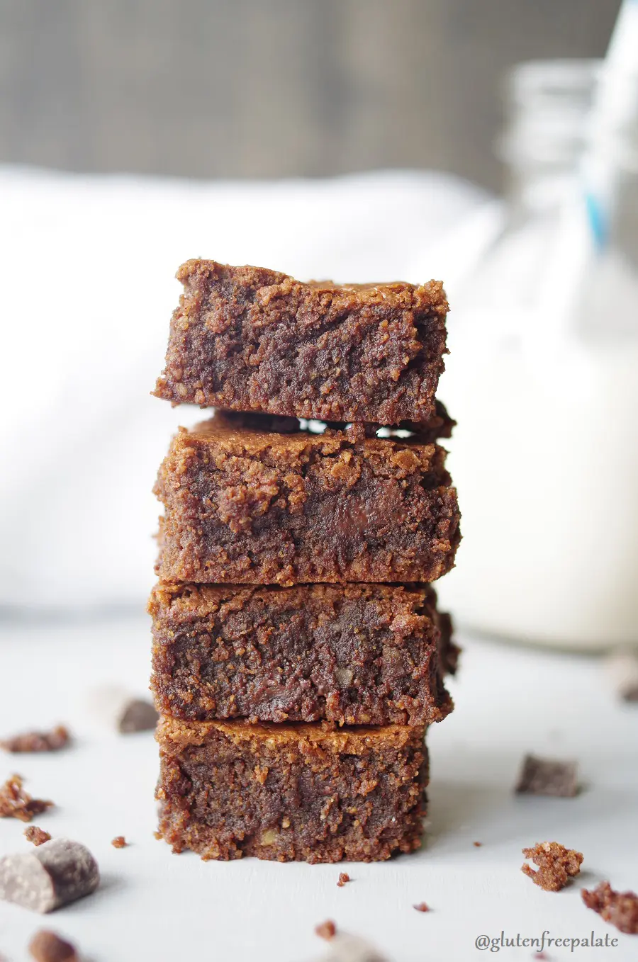 a close up of four brownies stacked