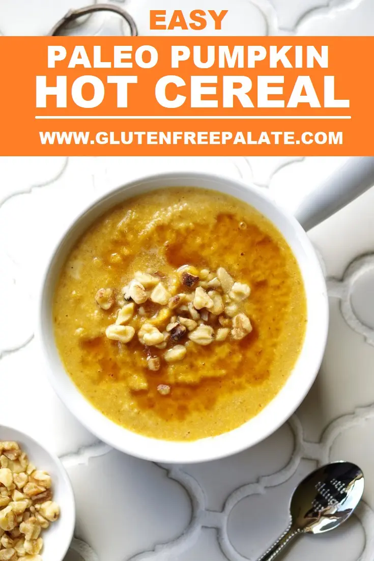 a pinterest pin of pumpkin porridge in a white bowl topped with chopped nuts, next to a spoon with the words easy paleo pumpkin hot cereal in text at the top