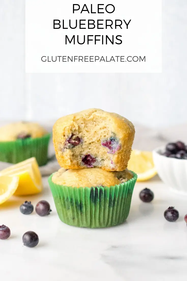 a pinterest pin with two muffins stacked, the top muffin has a bite out showing the blueberries on the inside, with the words paleo blueberry muffins at the top