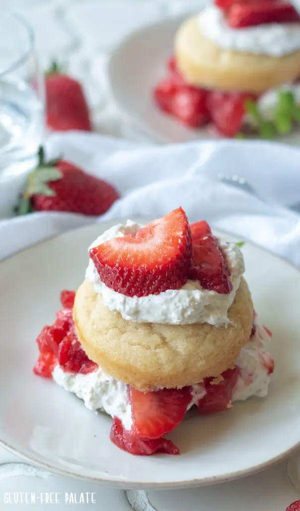 Gluten-Free Strawberry Shortcake with whipped cream and sliced strawberries