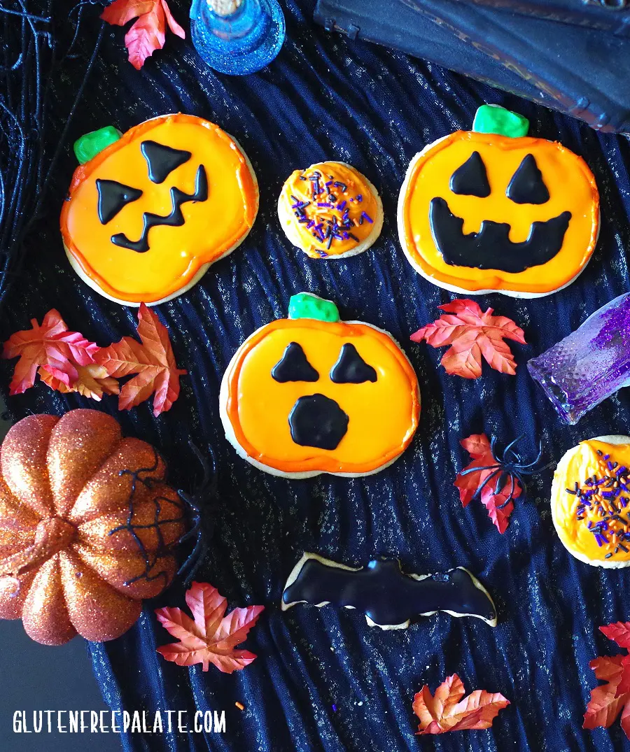 gluten-free sugar cookies decorated like pumpkins for Halloween