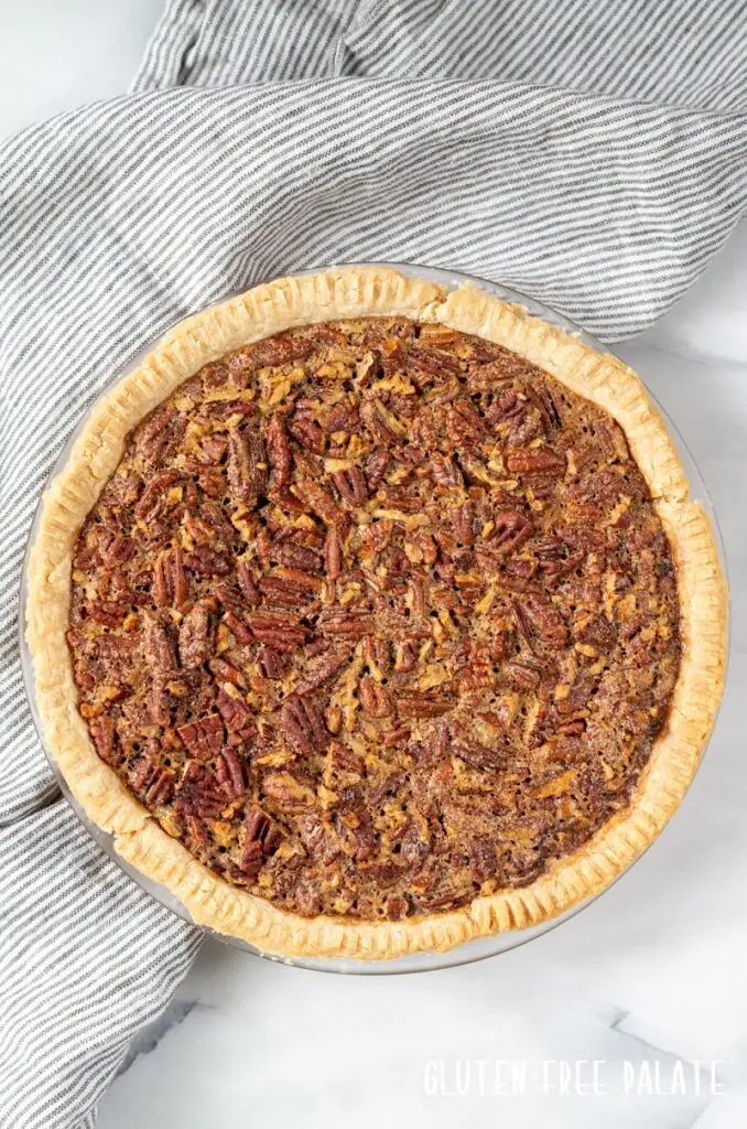 top down view of a whole gluten free pecan pie