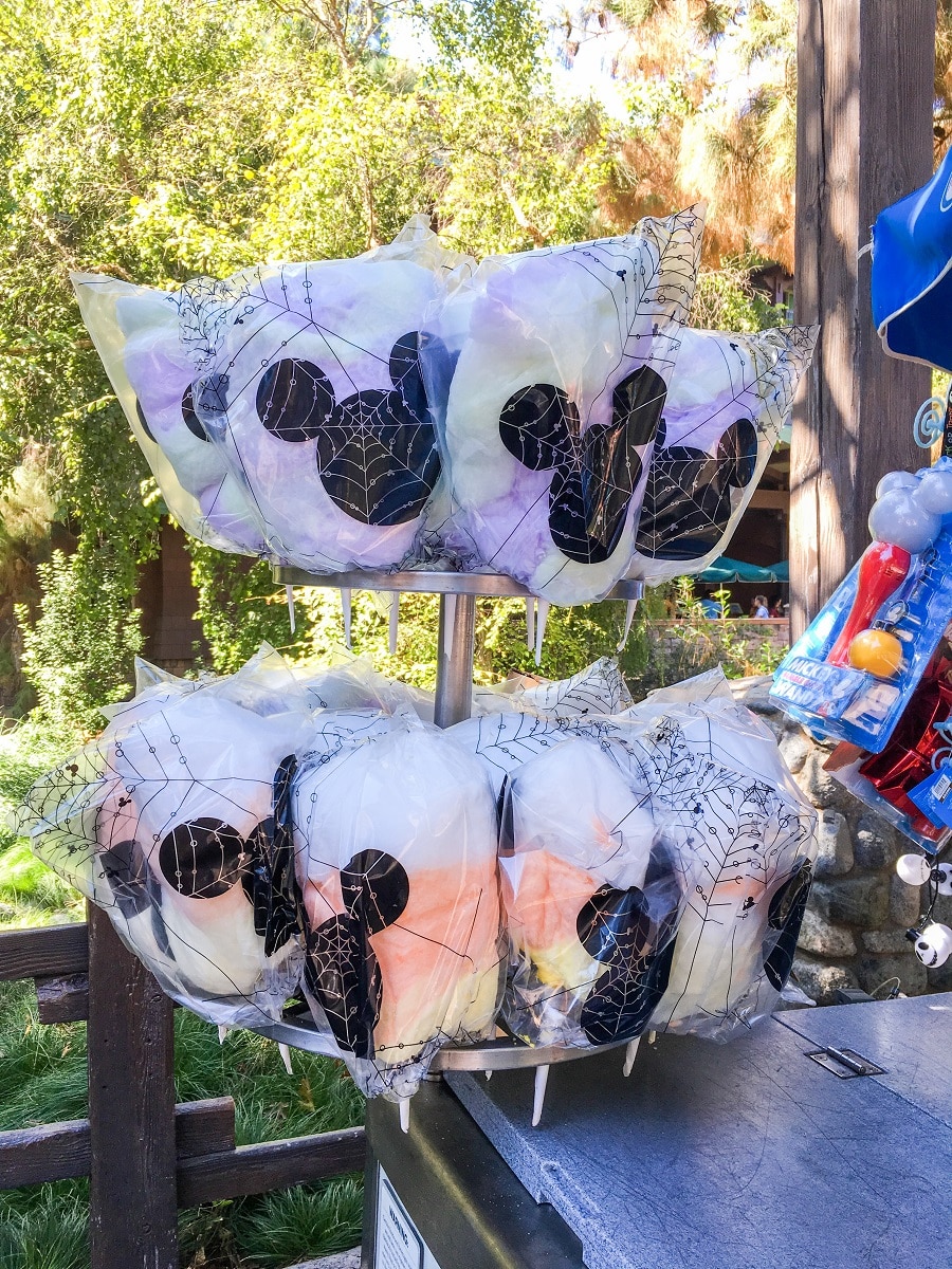 a tray of cotton candy with mickey ears printed on the packaging