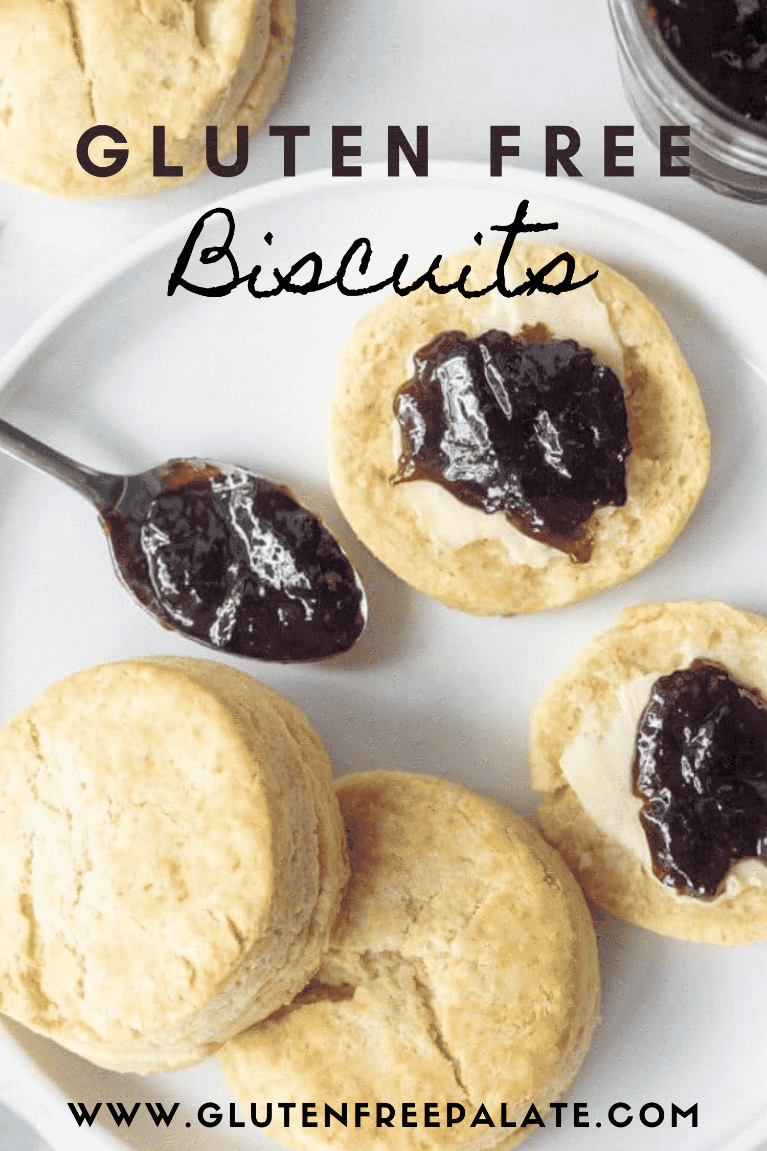 gluten free biscuits on a white plate, split and topped with dark purple jam, with text overlay