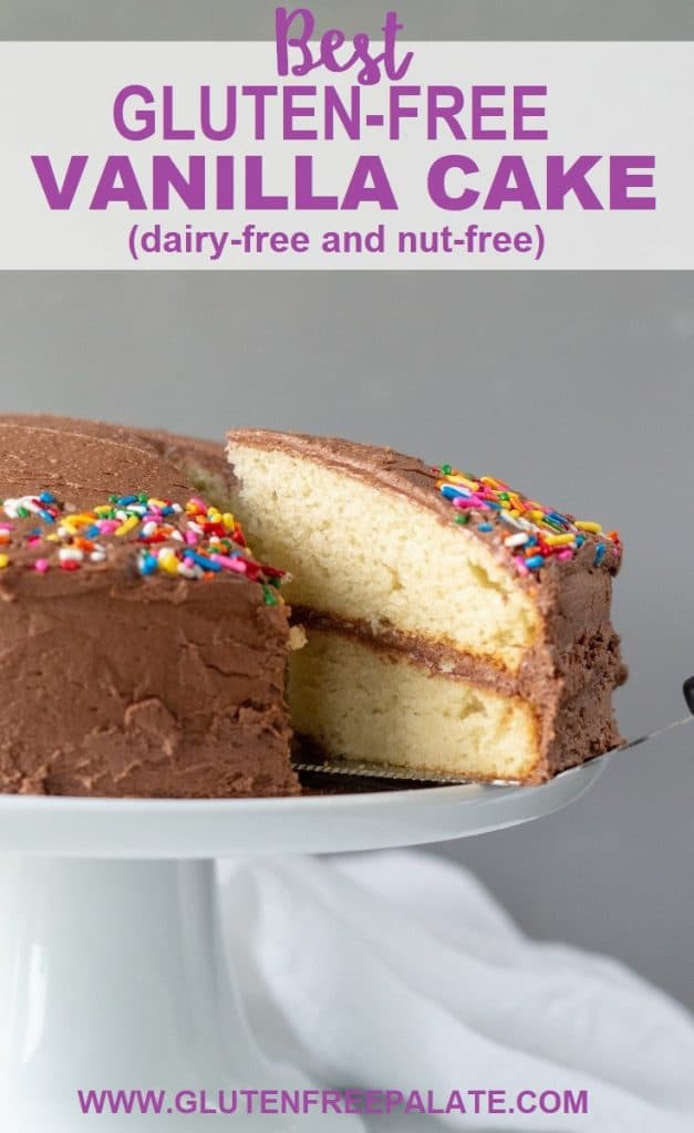A slice of gluten-free vanilla cake with chocolate frosting being served from a cake plate, with the words best gluten free vanilla cake written at the top