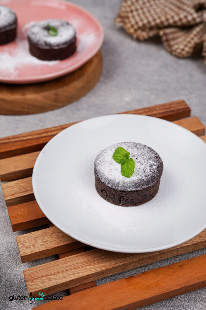 Here's the finished lava cake, decked out with powdered sugar and a mint leaf. Photo and recipe by Gluten-Free Palate.