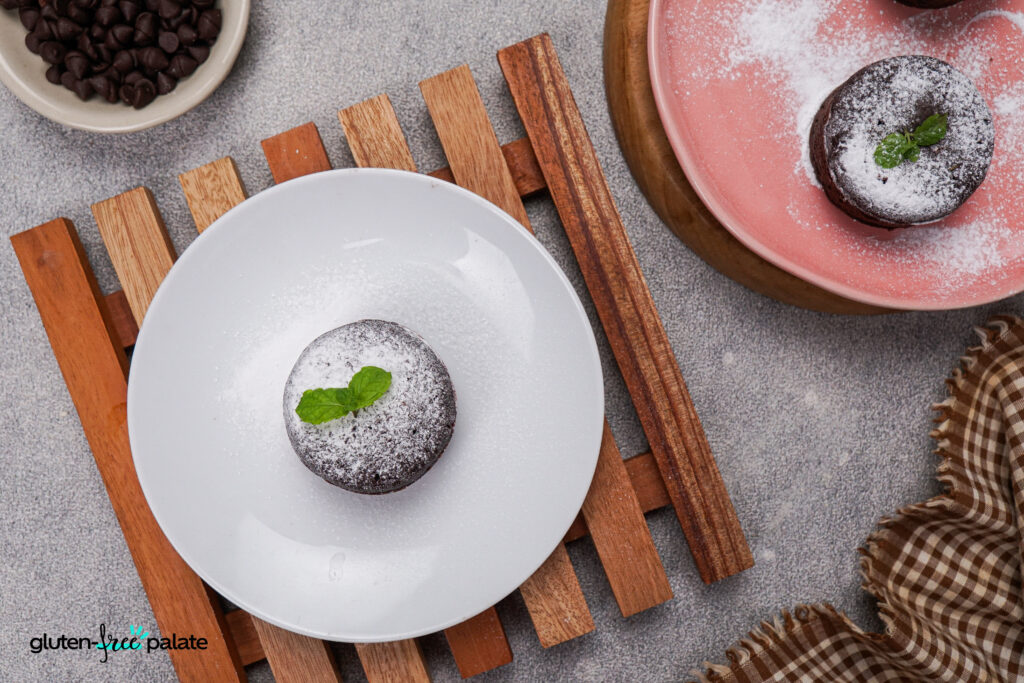 Use powdered sugar and a fresh mint leaf to top this lava cake. Photo and recipe by Gluten-Free Palate.