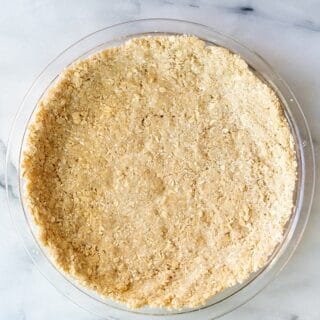 gluten-free graham cracker crust in a pie pan