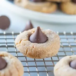 Gluten-Free Peanut Butter Blossoms on a cooling rack