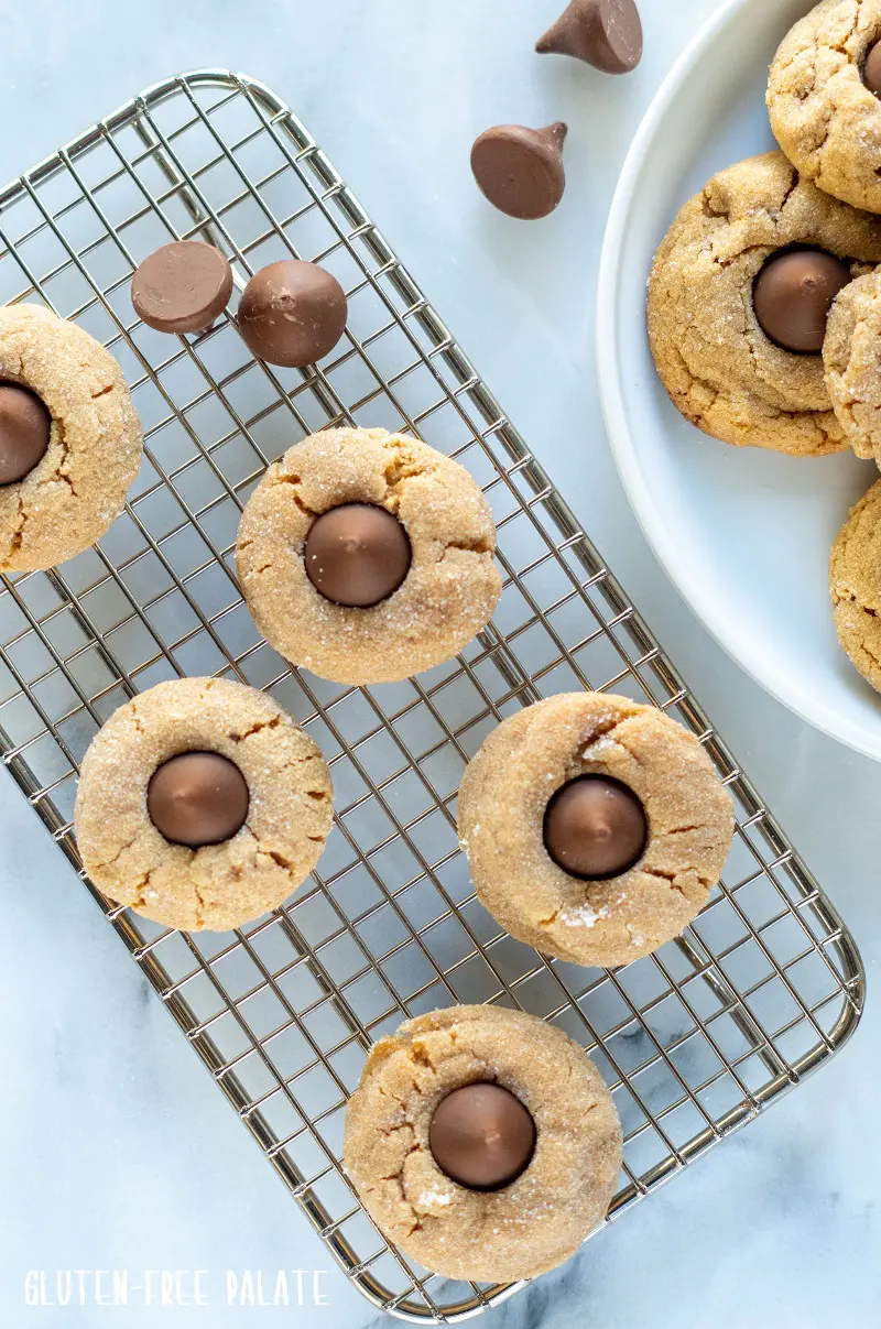 Gluten-Free Peanut Butter Blossoms on a cooling rack
