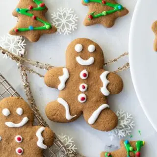 gluten free gingerbread men and tree cookies with white and green icing