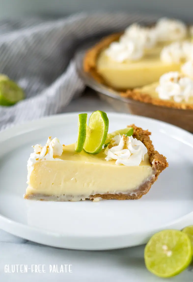 a slice of gluten free key lime pie on a white plate