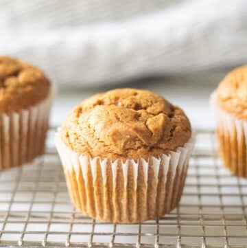 gluten-free pumpkin muffin on a wire cooling rack