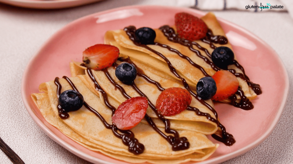 The finishing touches for these gluten free crepes? Fresh berries!