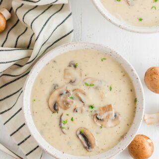 gluten free cream of mushroom soup in a white bowl