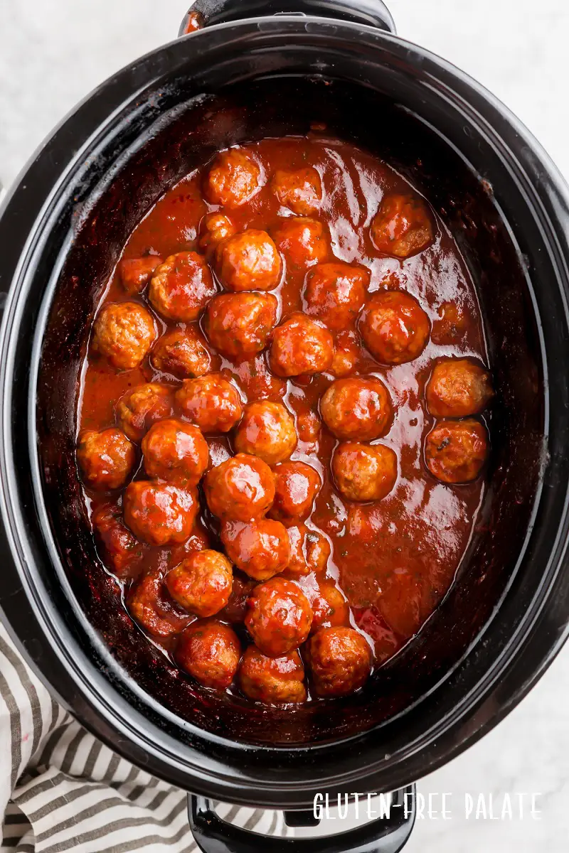 bbq meatballs in a crockpot with sauce