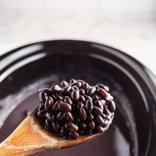 a wooden spoon ful of crockpot black beans