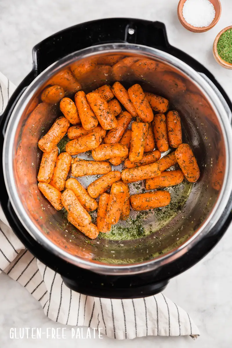 top down view of carrots cooking in an instant pot