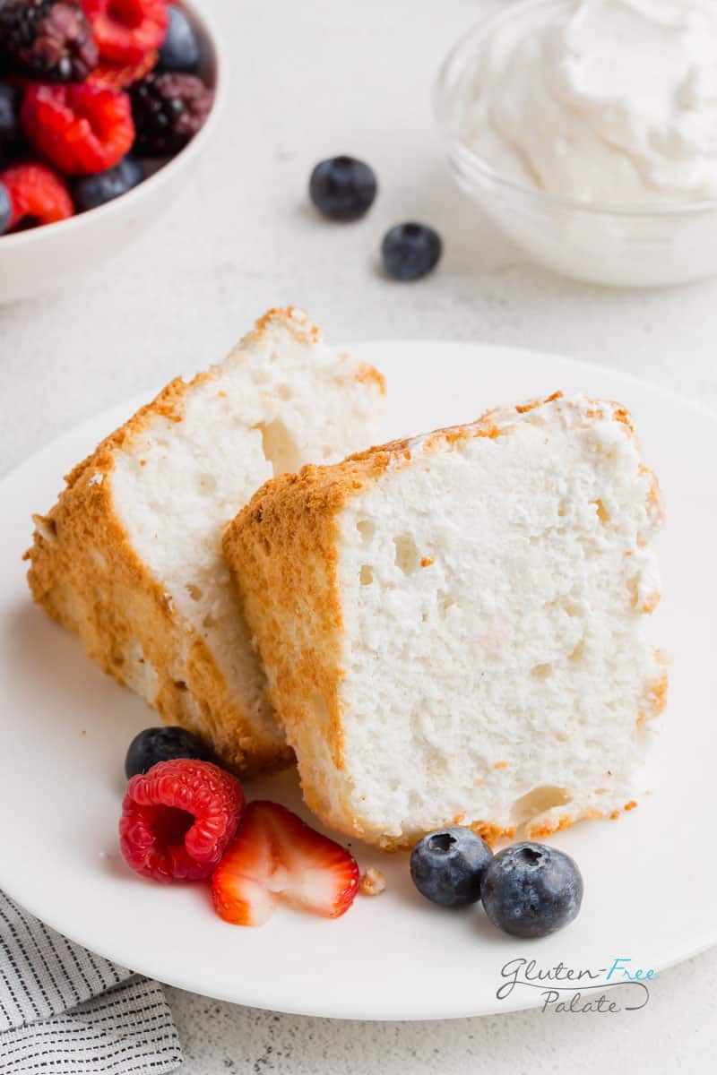 two slices of gluten-free angel food cake on a white plate