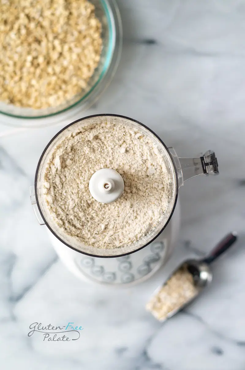 a food processor filled with oat flour