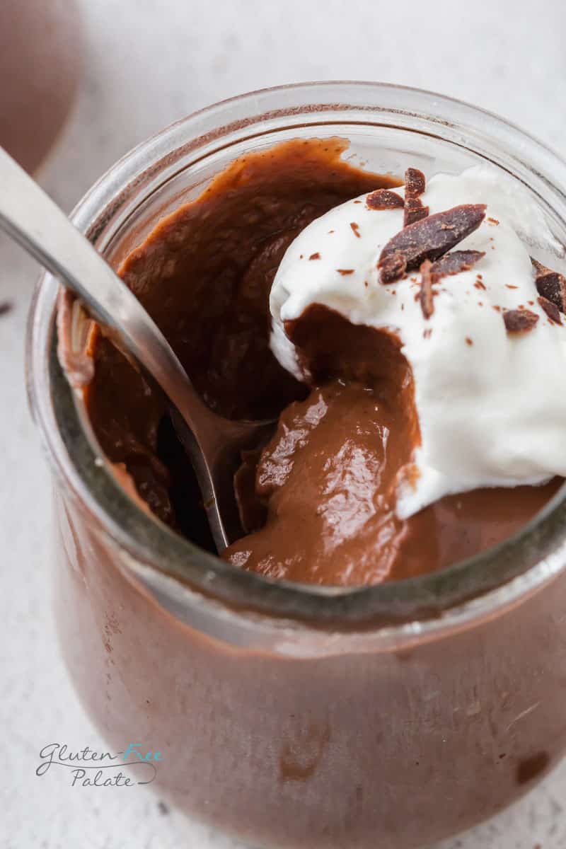 close up of a bite out of vegan chocolate pudding