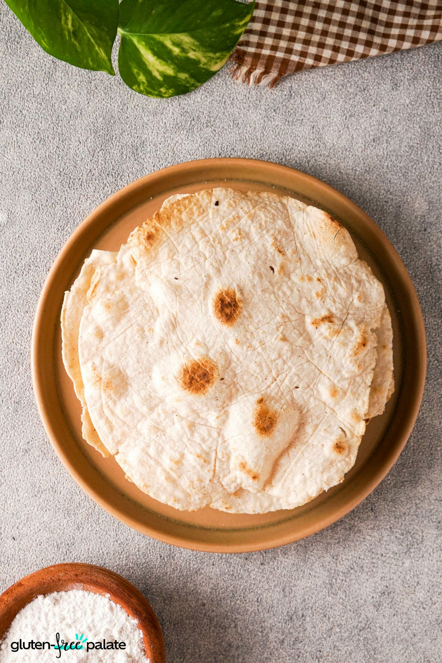 Stacked Gluten-Free Tortillas on a plate.