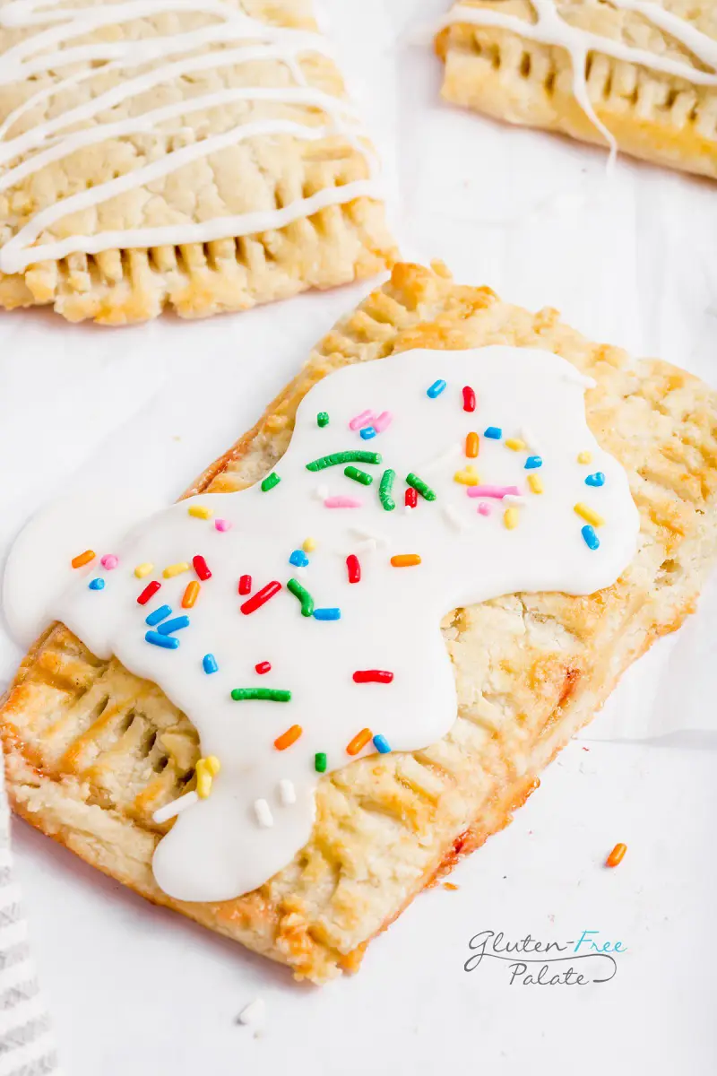 gluten-free pop tart topped with a white glaze and sprinkles