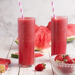 two glasses filled with strawberry watermelon smoothie