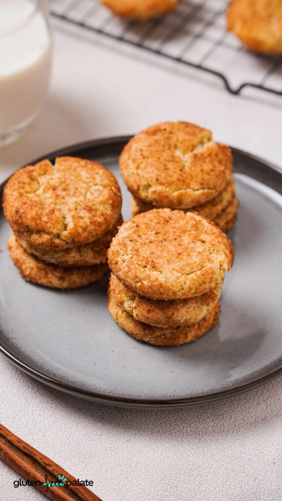 Gluten-Free Snickerdoodles stacked on a plate.