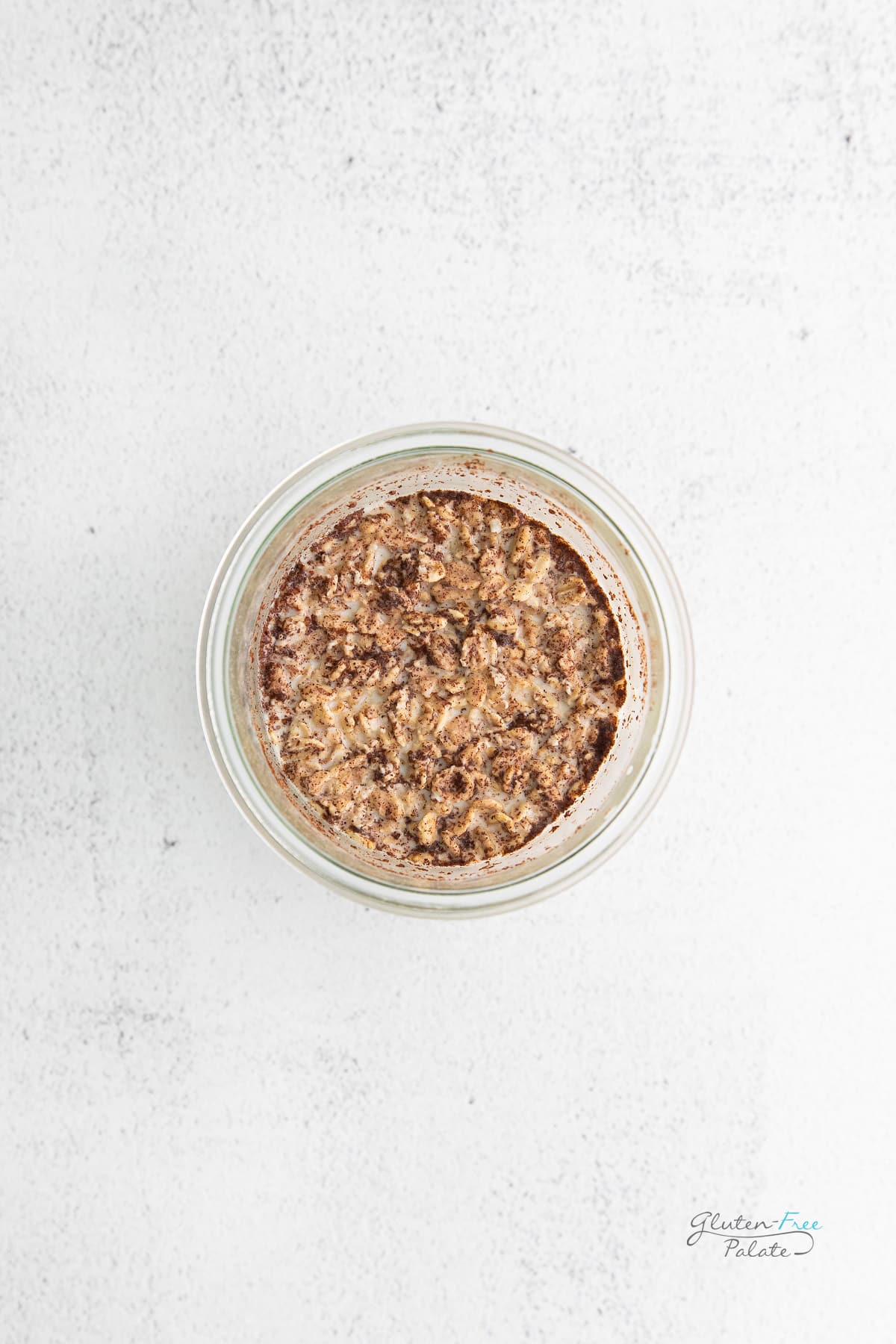 A jar of overnight oats, viewed from above.