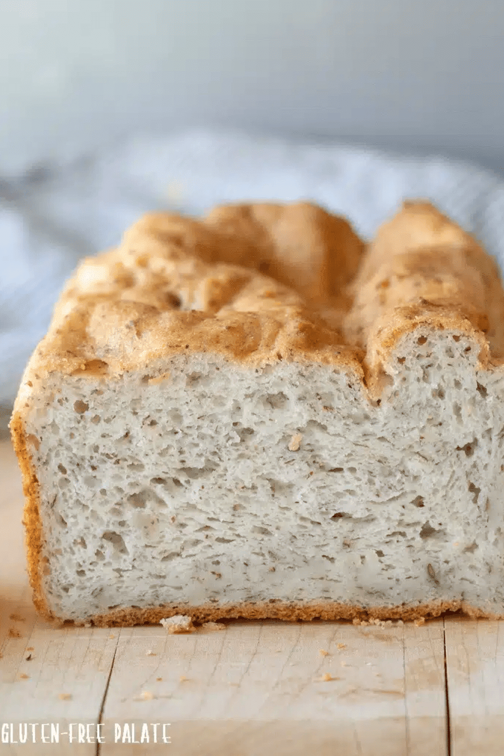 A loaf of gluten-free bread shown sliced.