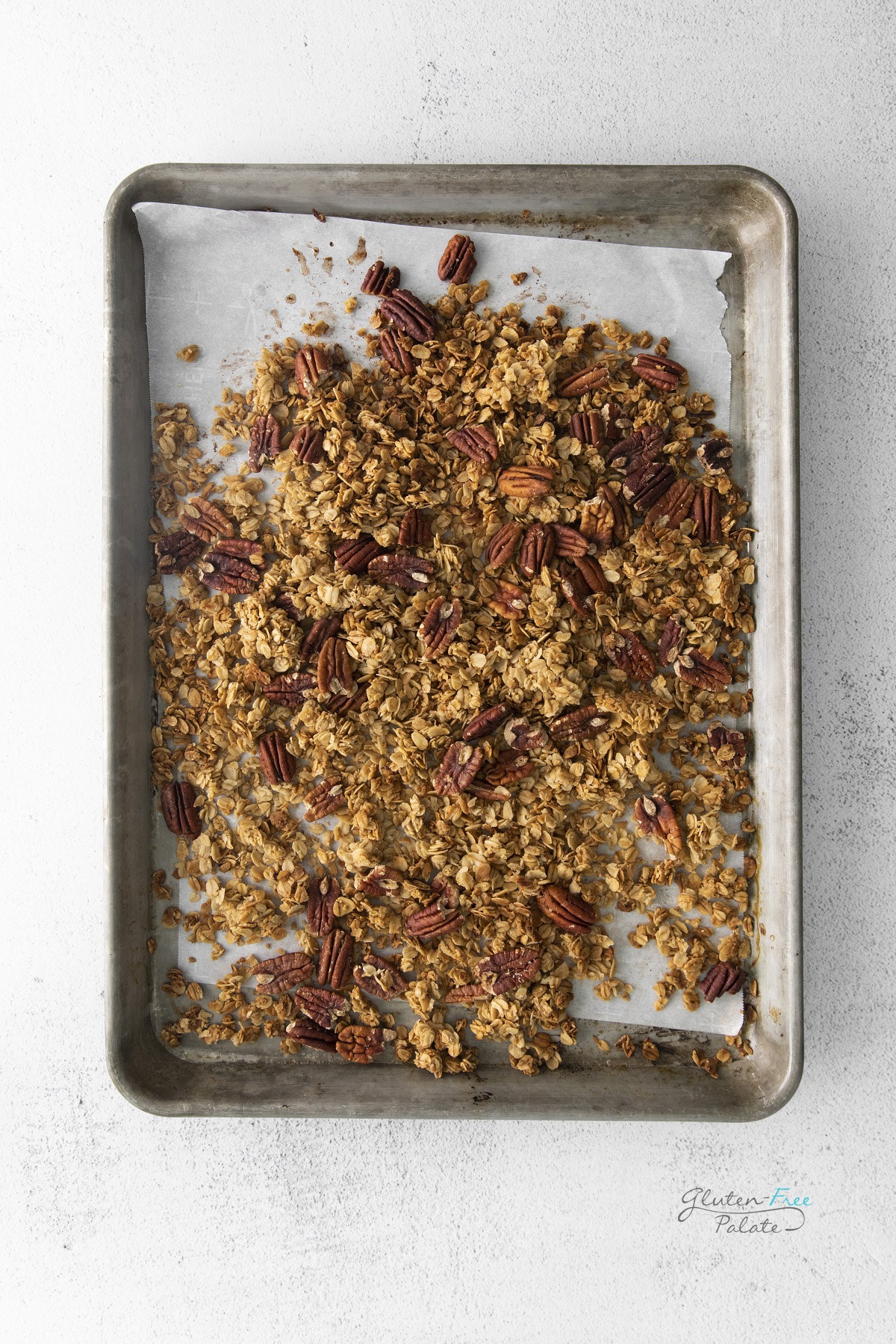 gluten-free vegan granola on a baking pan.