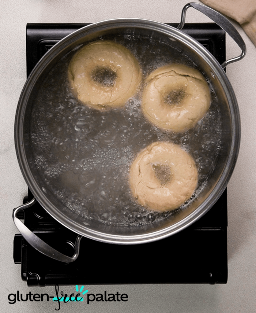 Drop the shaped bagels into boiling water.