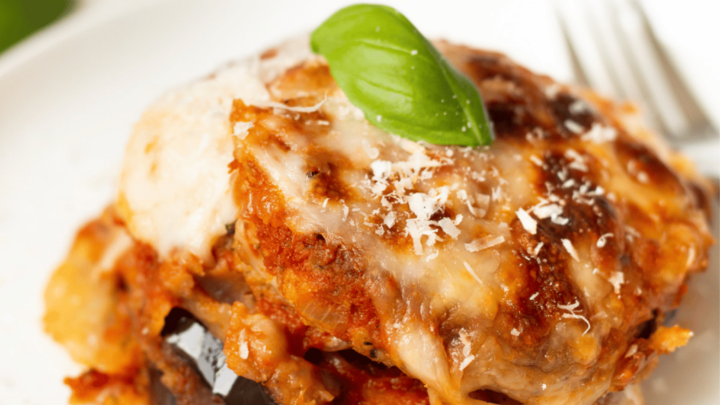 gluten-free eggplant parmesan on a white serving plate