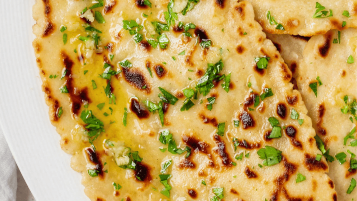 closeup view of a piece of gluten free naan on a plate