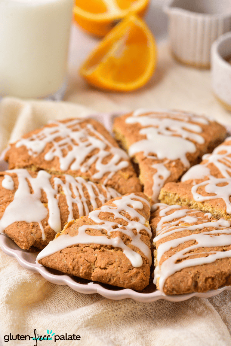 gluten-free pumpkin scones on a pink serving plate.