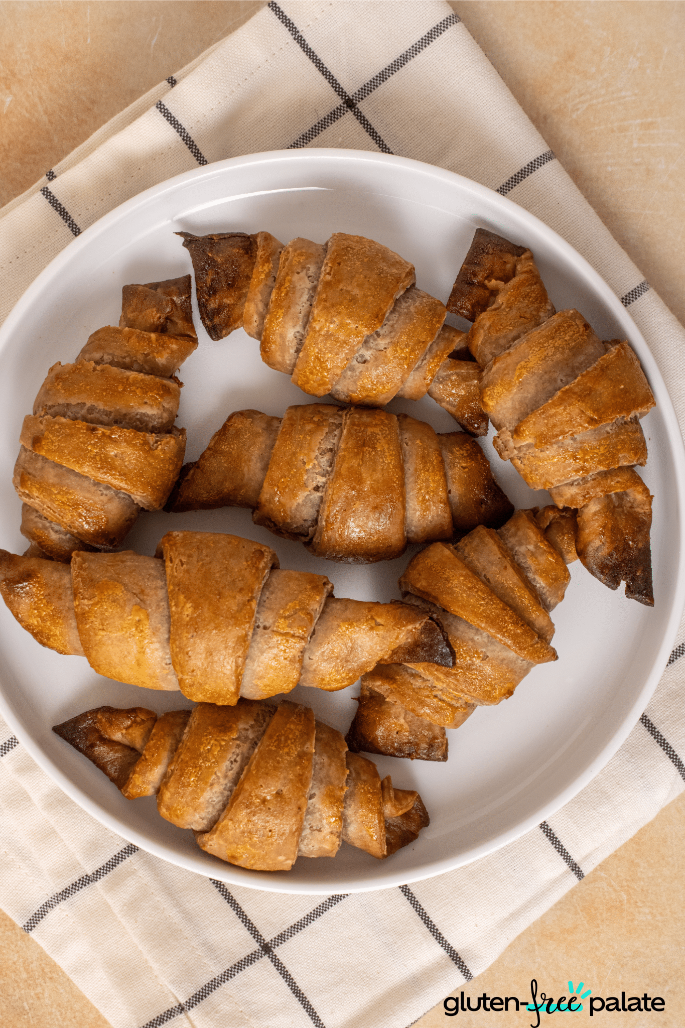 gluten-free croissant on a white plate