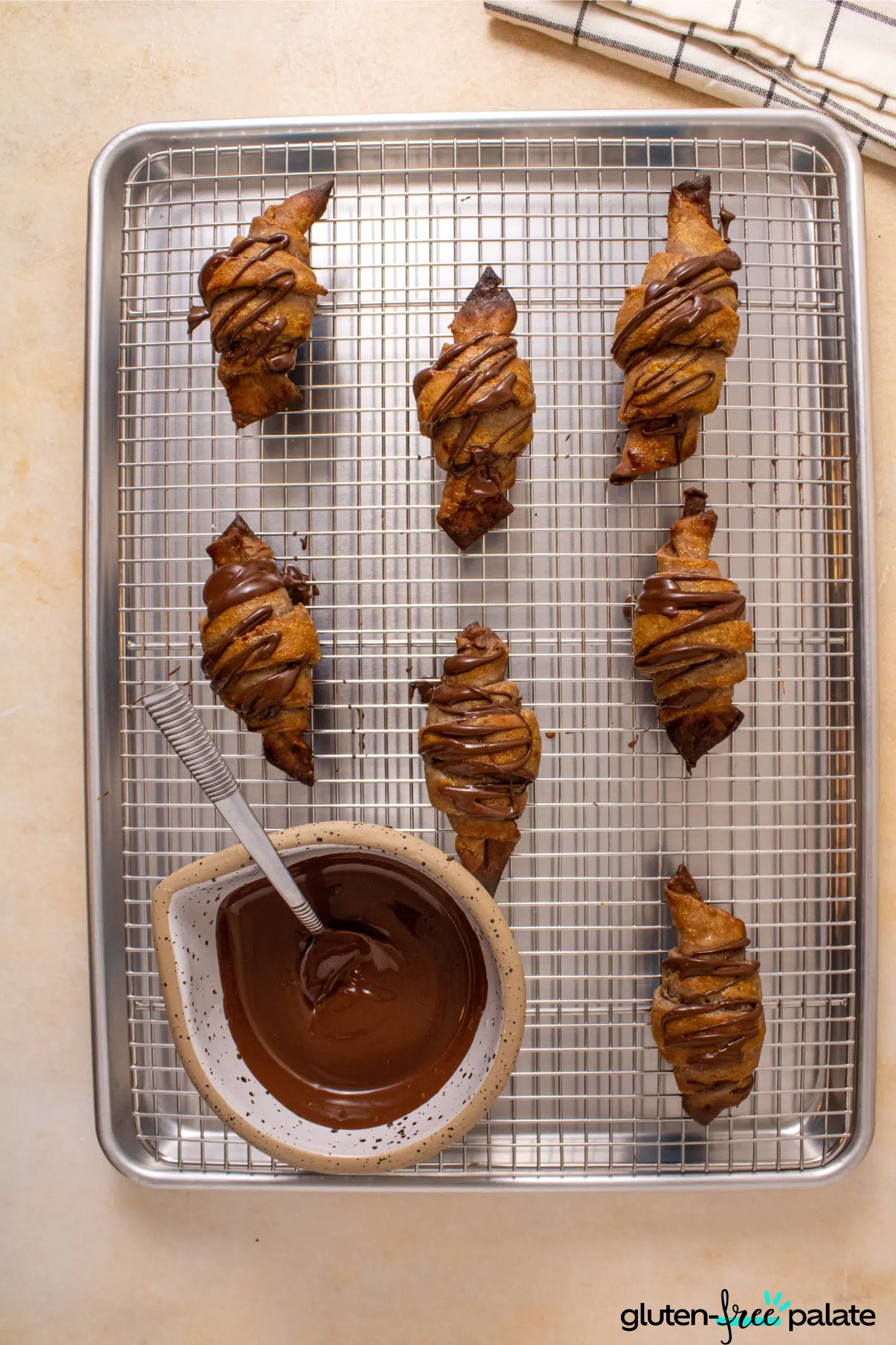 gluten-free croissant on a cooling rack.