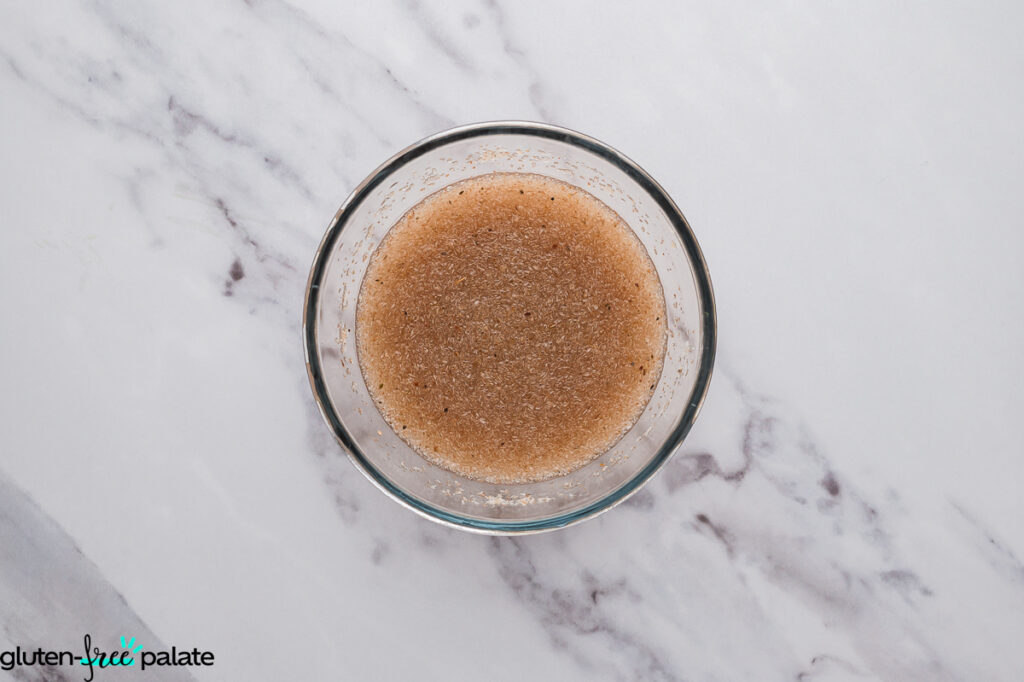 Small glass bowl with hydrated psyllium husk mixture, thickened into a gel.