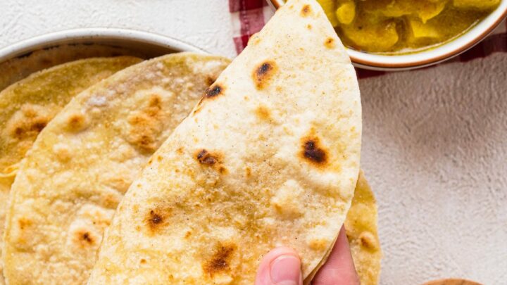 Gluten-free roti being served with curry