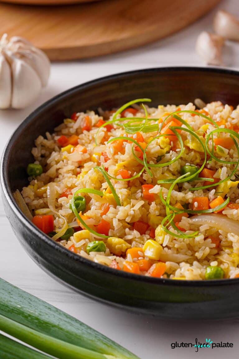 Gluten-free fried rice in a black bowl.